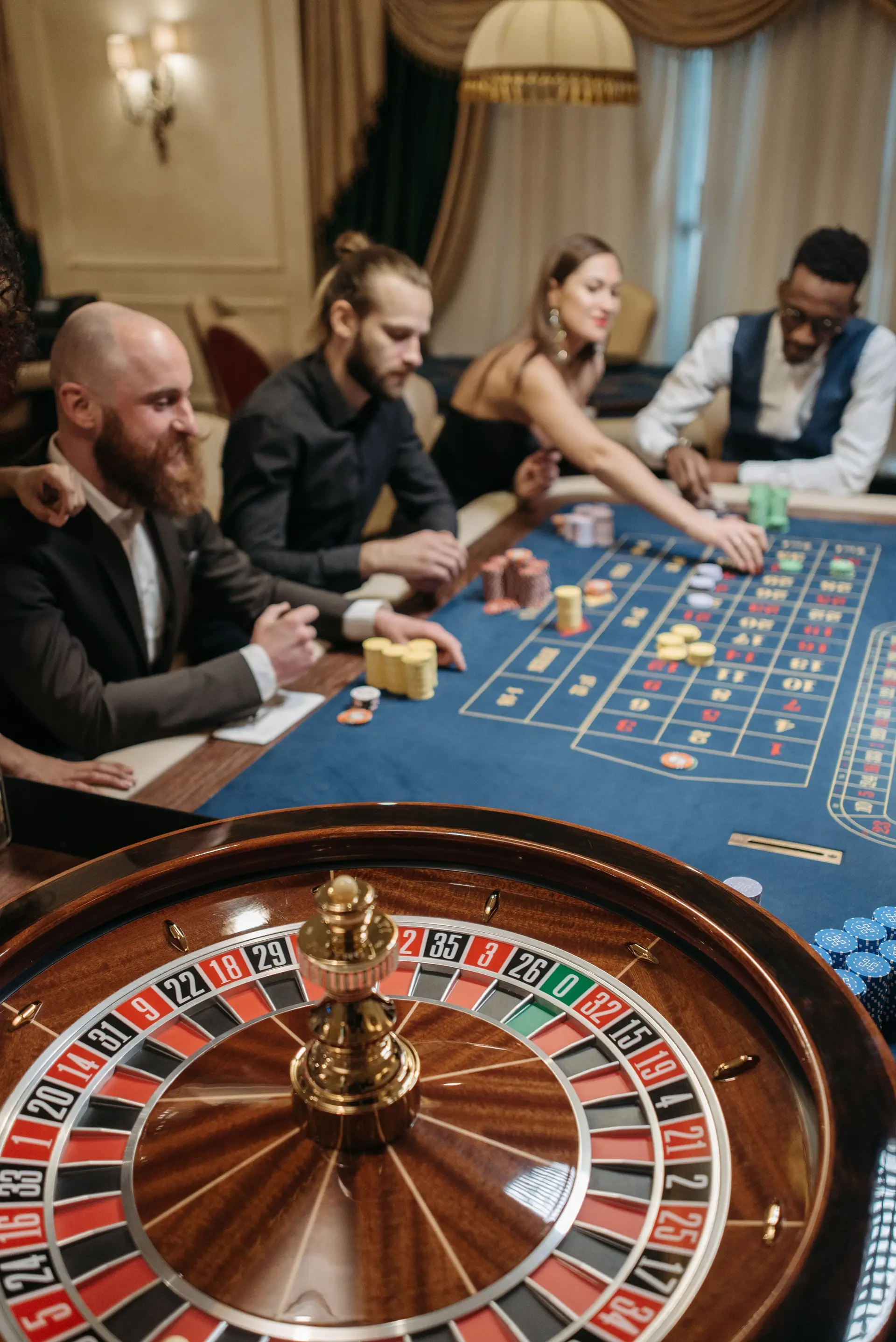 Guests gathered around a classic gaming table